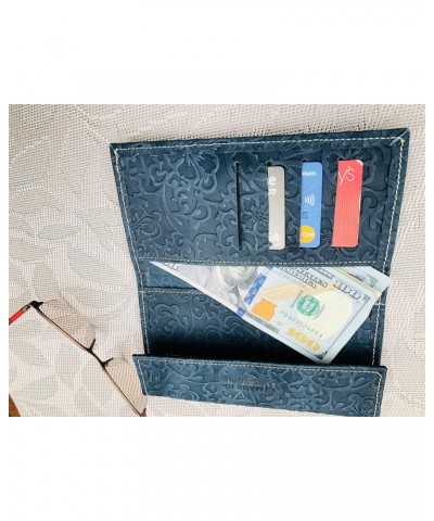 A trifold women's snap wallet handcrafted from 100% genuine leather with a whimsical floral carving $16.39 Wallets